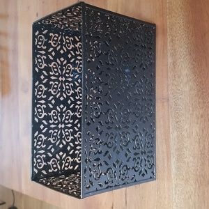 Metal storage bin with cut-out design